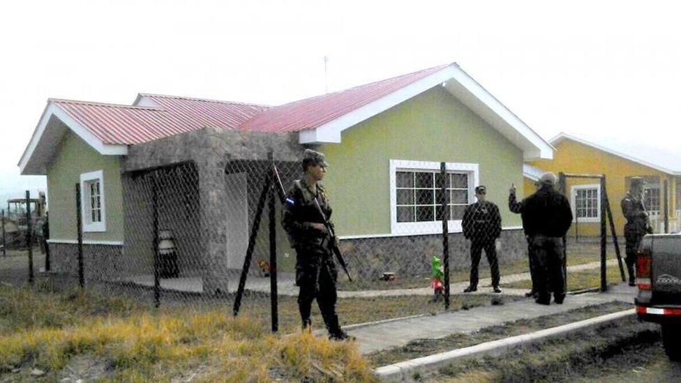 Soldiers watch the house where Honduran environmentalist Berta Caceres was murdered, in La Esperanza, 200 km northwest of Tegucigalpa, on March 3, 2016.