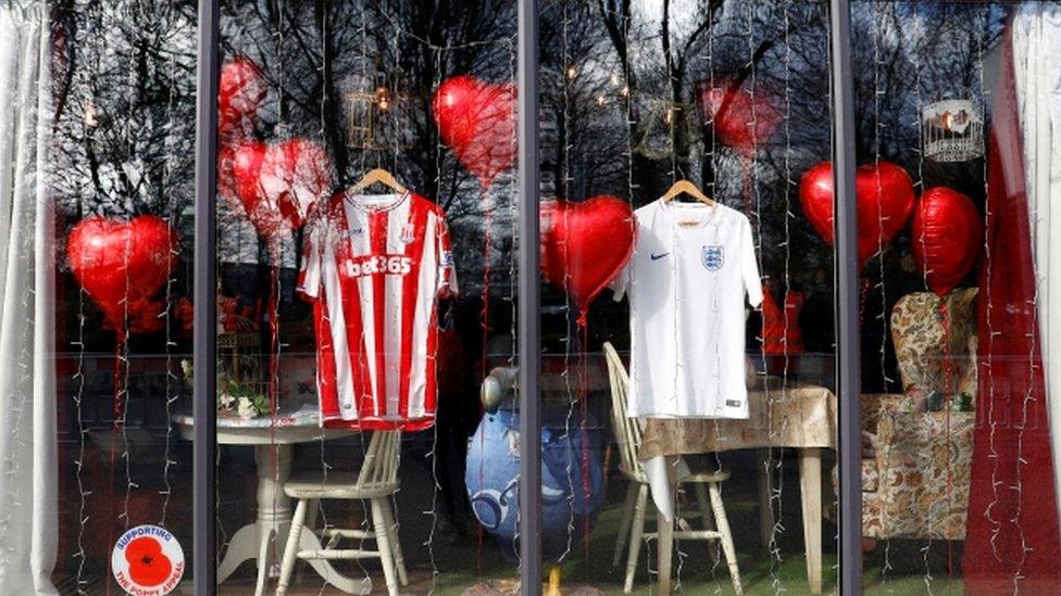 Shop window with shirts