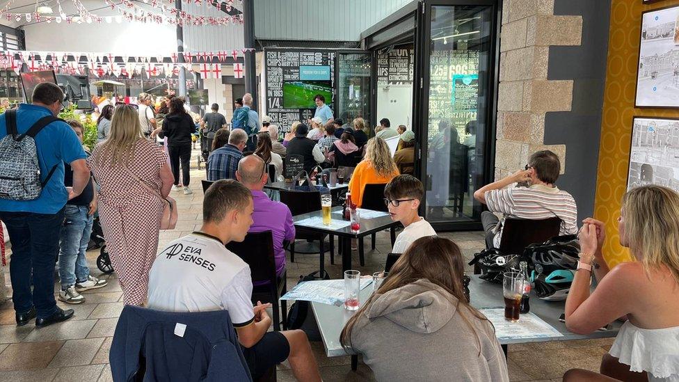 People watching England match at Liberty Wharf