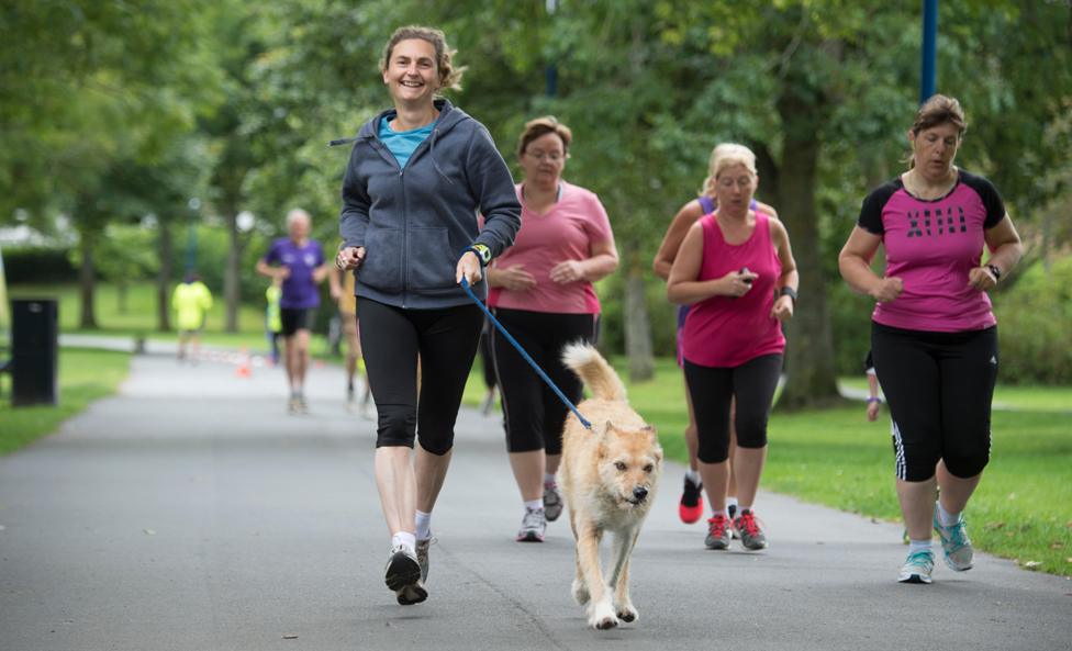 Parkrunners with dog