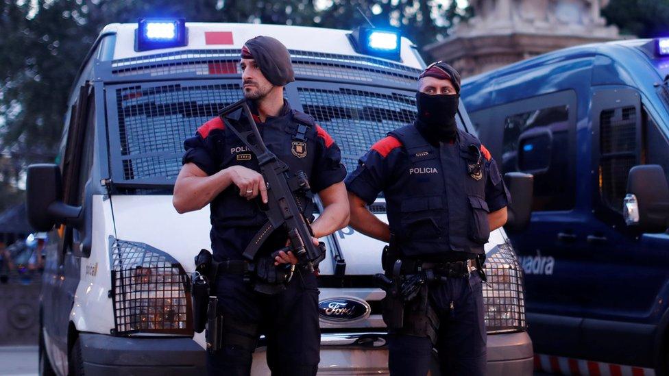 Catalonia's regional police force, the Mossos d'Esquadra, guard the regional assembly parliament building in Barcelona, 10 October 2017