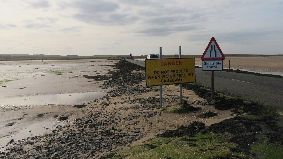 Warning sign about the tidal causeway, Holy Island