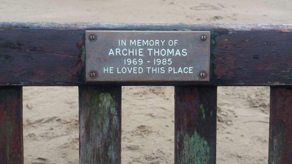 The plaque on Archie Thomas' memorial bench