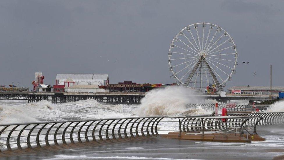 Blackpool-Promenade-with-waves-crashing-over-barrier.