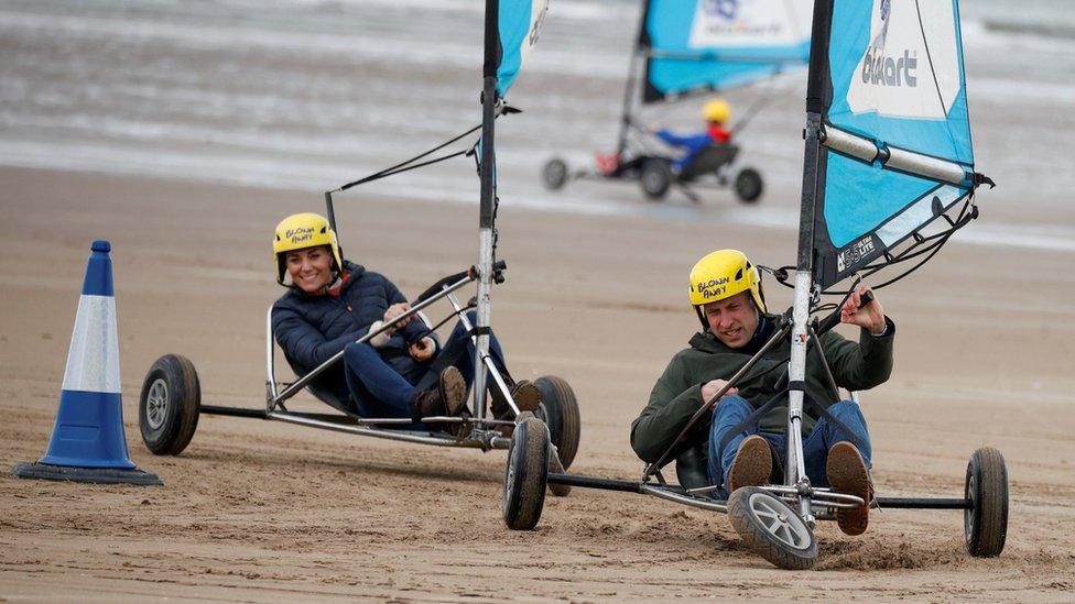 William and Kate ride land yachts on the beach in St Andrews