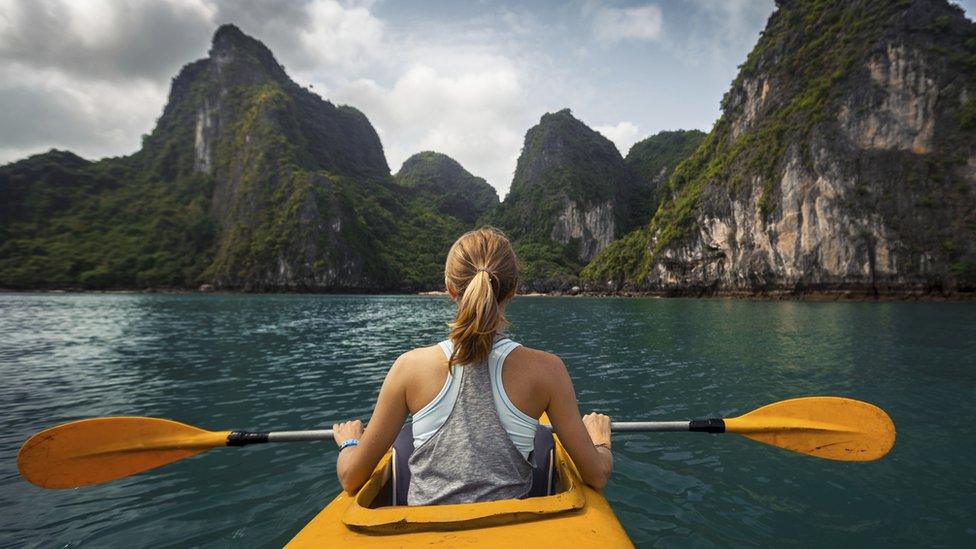 Woman canoeing