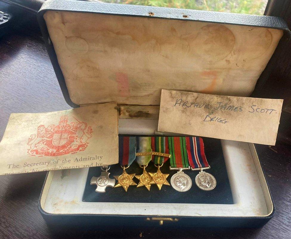 Duplicate war medals, with a note listing and describing them and his name