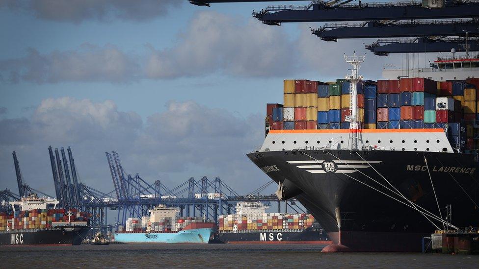 A ship carrying large containers comes in to Felixstowe port