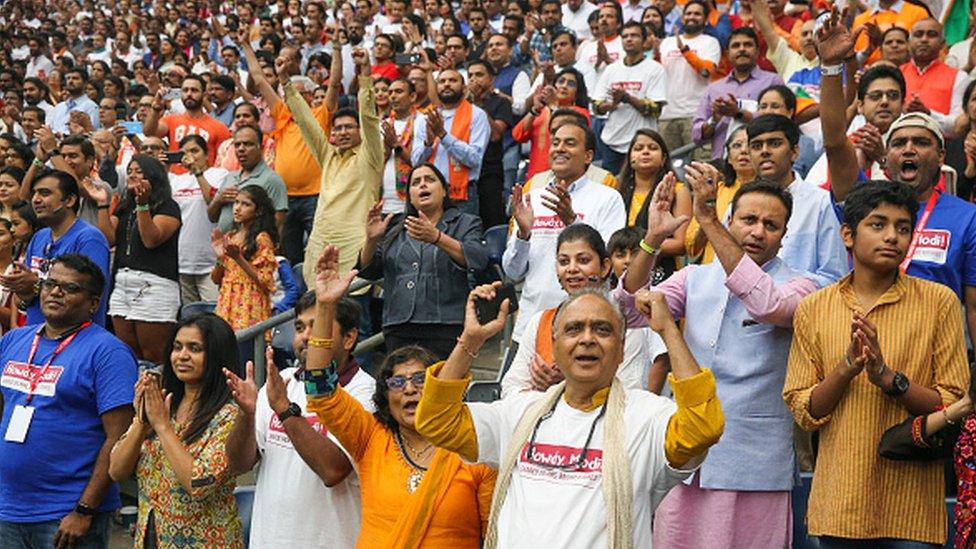 Audience members cheer India Prime Minister Narendra Modi at the Community Summit on September 22, 2019 at NRG Stadium Houston, Texas