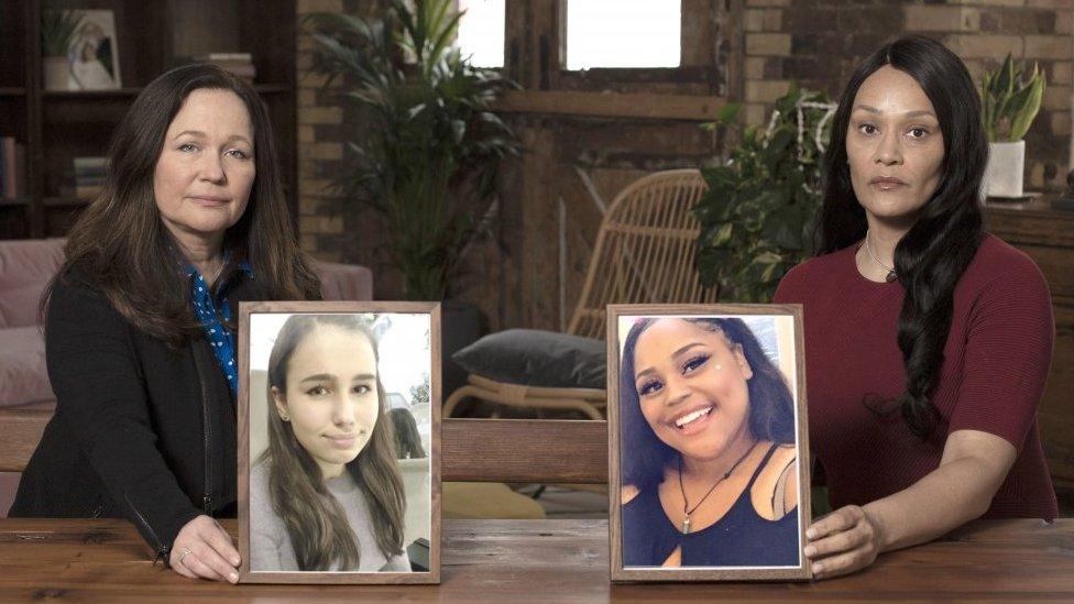 Tanya Ednan-Laperouse (left) and Emma Turay holding up pics of their daughters, Natasha and Shante.