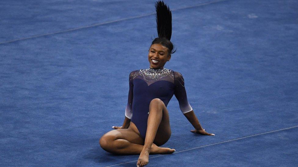 UCLA Bruins gymnast Nia Dennis competes in the floor exercise against the Arizona State Wildcats during the season opener in Pauley Pavilion on the campus of UCLA in Los Angeles on Saturday, January 23, 2021.