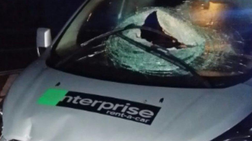 Car damaged by breeze block. Pic: NWDevonPolice/Twitter