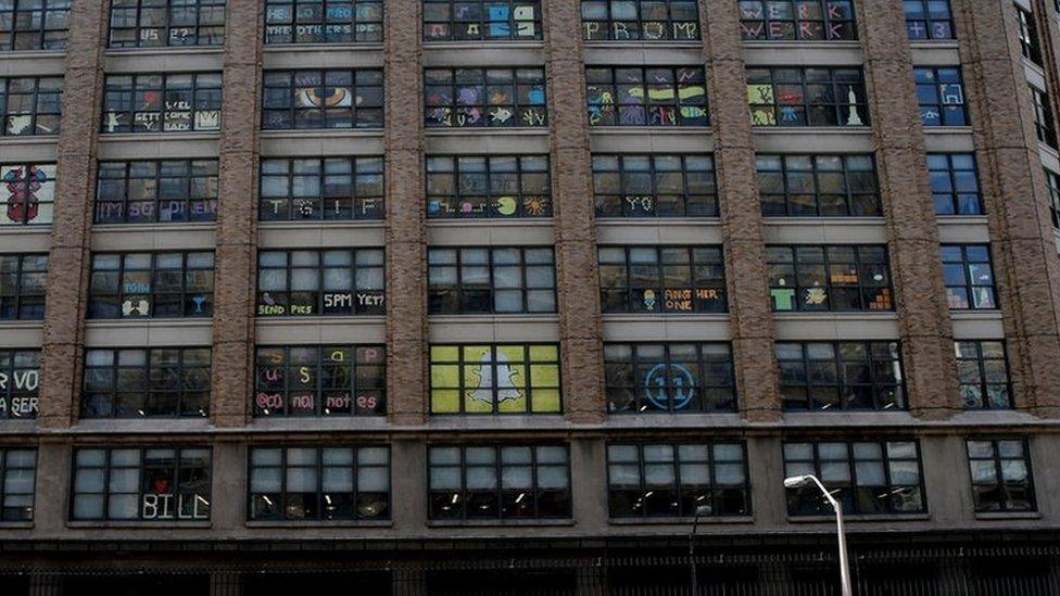 Building with art in windows