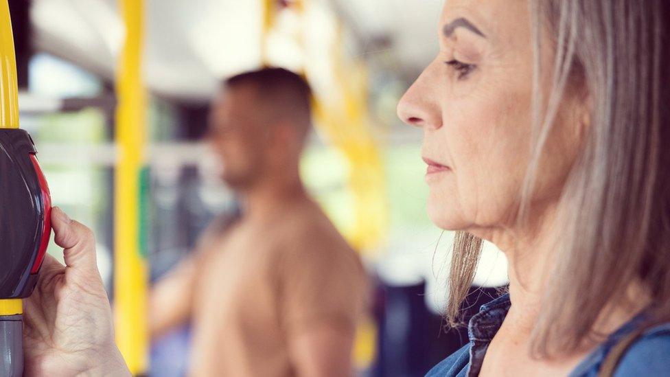 Woman travelling by bus - generic