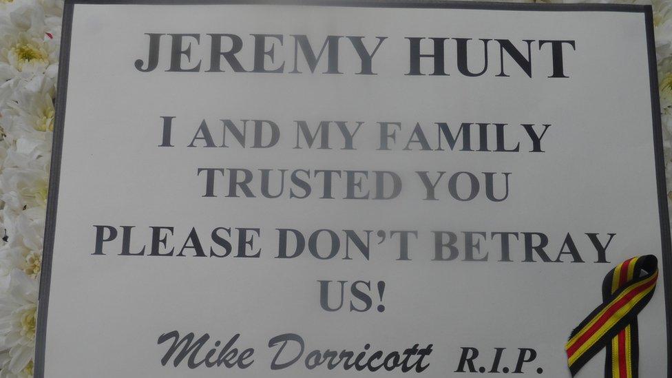 Plaque placed outside Jeremy Hunt's constituency office following Mr Dorricott's death