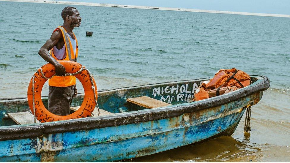 Lifeguard Nicholas Paul on his boat