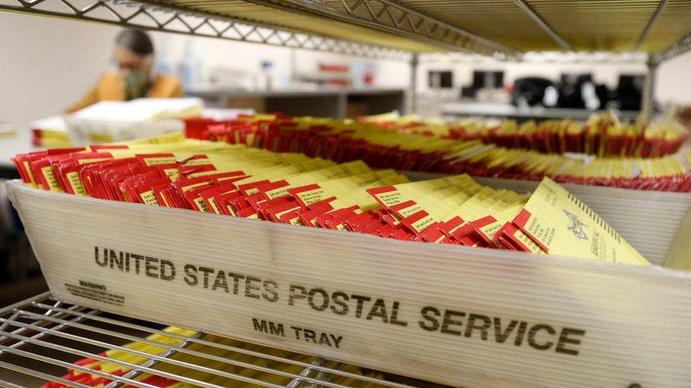 Mail in ballots waiting to be processed in USPS trays