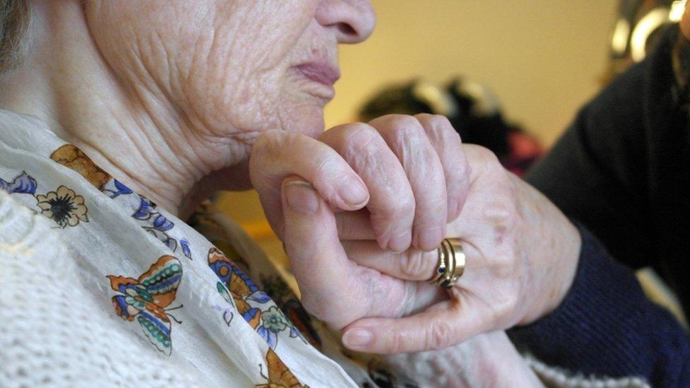 Elderly person being cared for at home