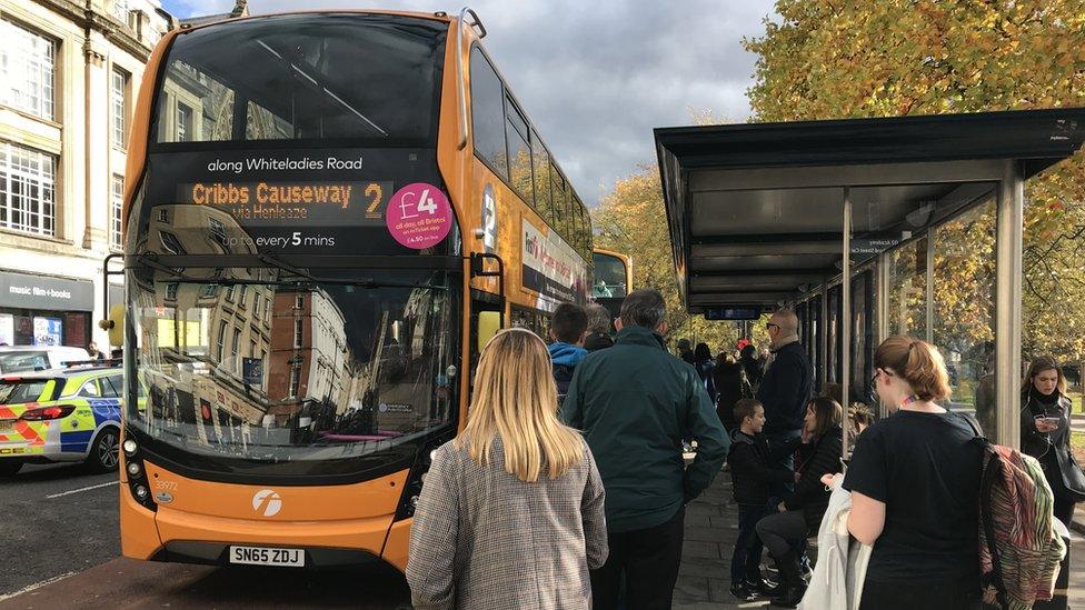 Passengers boarding a bus