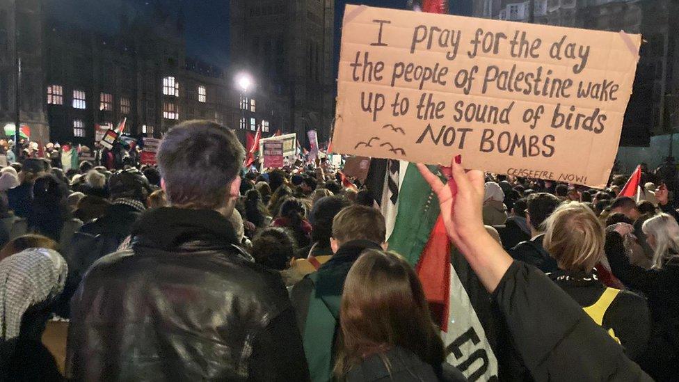 Many gathered with flags to call for peace