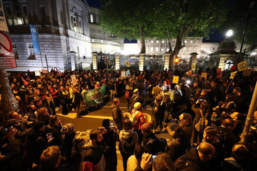 Extinction Rebellion protesters demonstrate outside Leinster House in Dublin