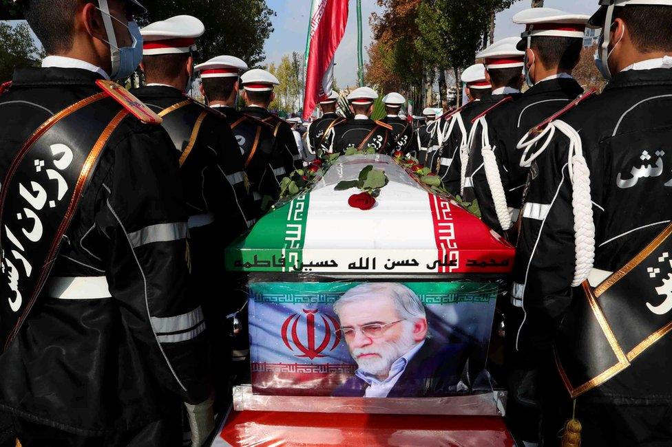 Iranian troops hold Mohsen Fakhrizadeh's coffin at a funeral ceremony in Tehran (30 November 2020)