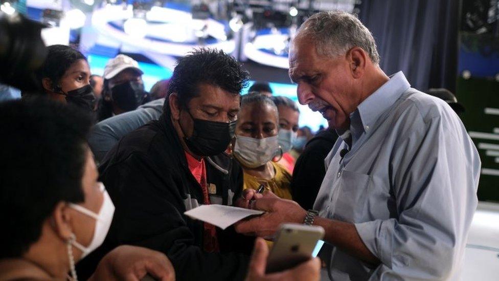 Nasry Asfura, presidential candidate of the National Party of Honduras, talks with people after a TV interview in Tegucigalpa, Honduras November 26, 2021