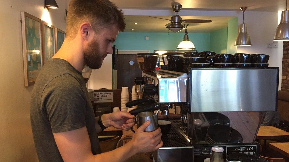 Barista making coffee