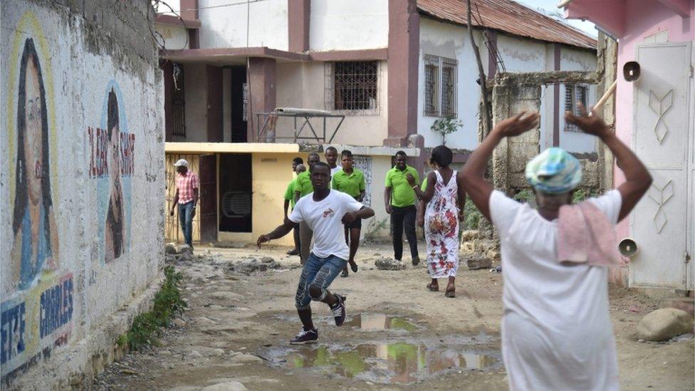 Haitians recover from an earthquake in 2018