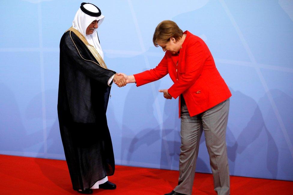 German Chancellor Angela Merkel welcomes Saudi Minister of State Ibrahim Abdulaziz Al-Assaf at the G20 summit in Hamburg, 7 July