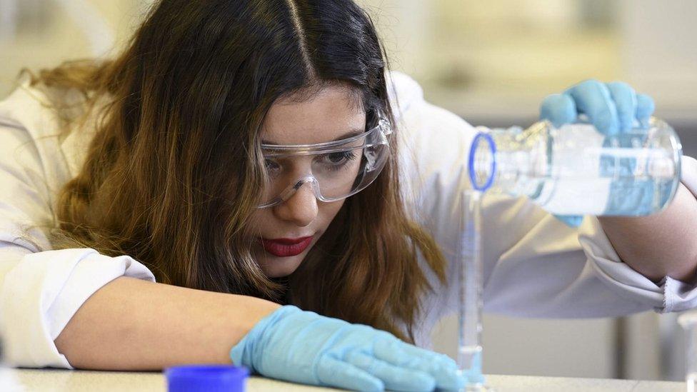 Student using chemicals in lab