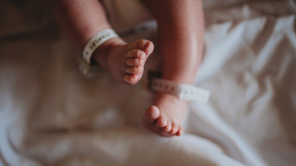 New born baby's feet - generic image