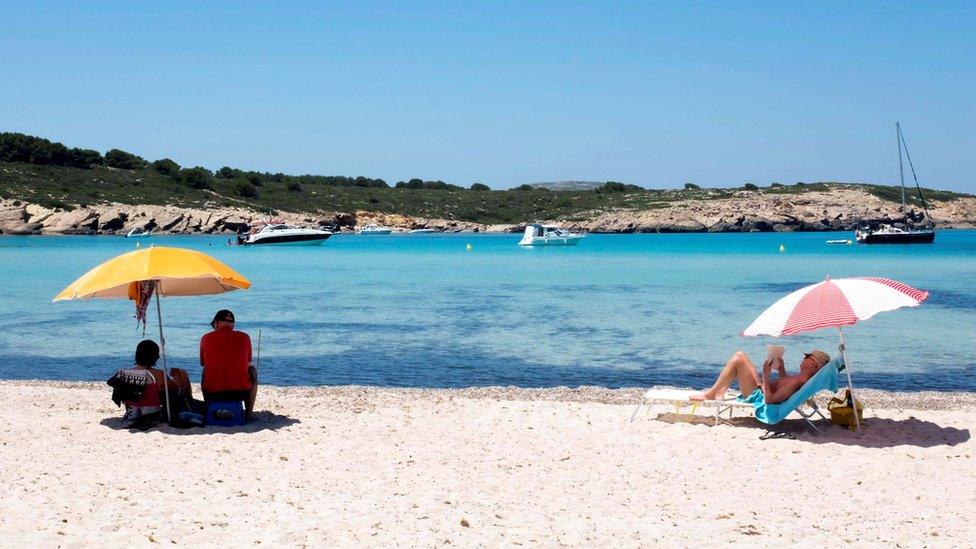 People on Menorca beach