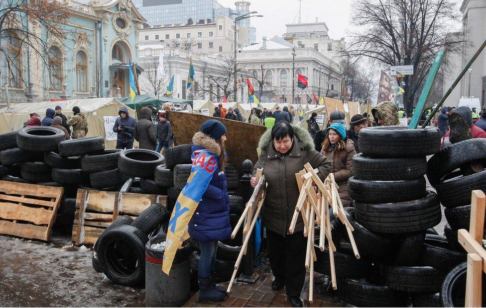 Supporters of the former Georgian president and ex-Odessa Governor Mikheil Saakashvili setup a barricade in their tent camp near of Parliament building in Kiev