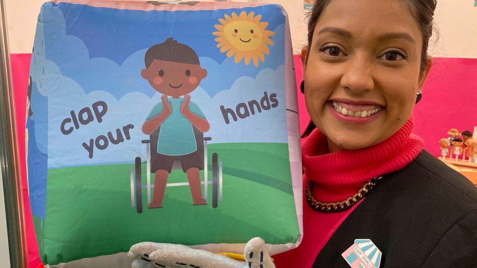 Nazneen Yasin with a large inflatable dice