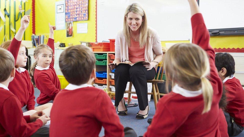 A teacher with her students