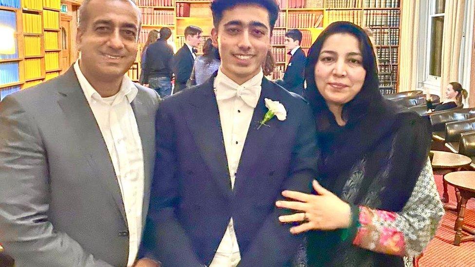 Ahmad Nawaz with his parents