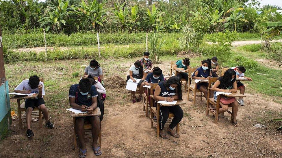 Indigenous students learning outside in Peru