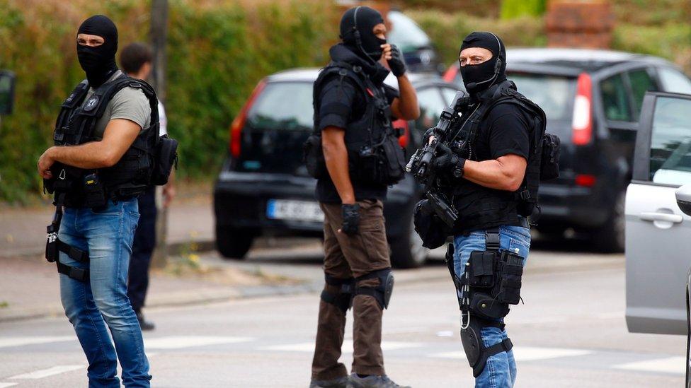 French special police near suspect's house