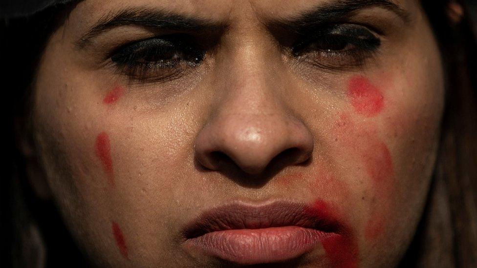 A woman participates in a protest against the alleged rape and murder of a 27-year-old woman on the outskirts of Hyderabad, in New Delhi, India, December 2, 2019