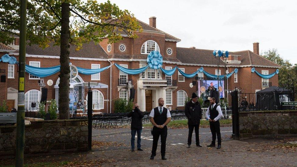 Security guards outside the building