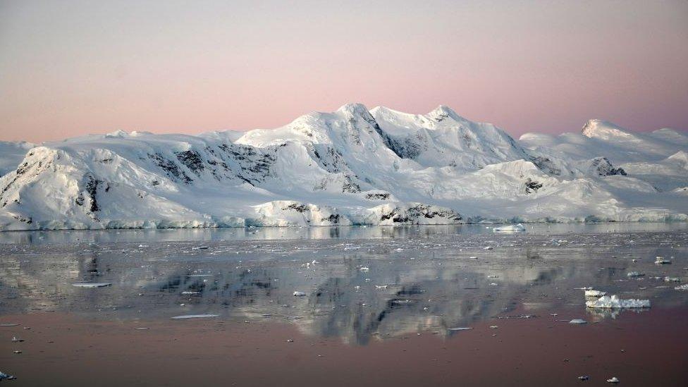 View of a glacier at sunset in Antarctica