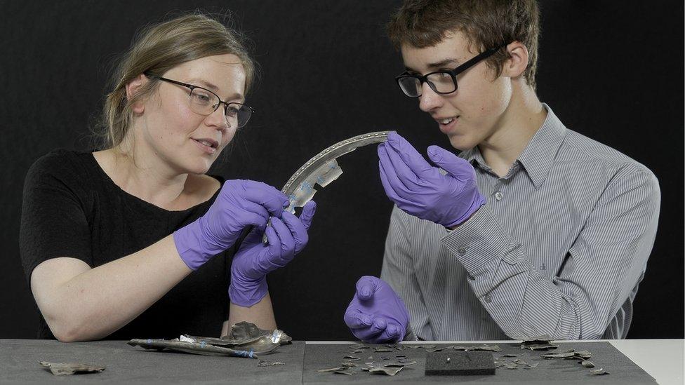 Glenmorangie Research Fellow Alice Blackwell inspects the Dairsie Hoard with finder David Hall (pic Neil Hanna).jpg