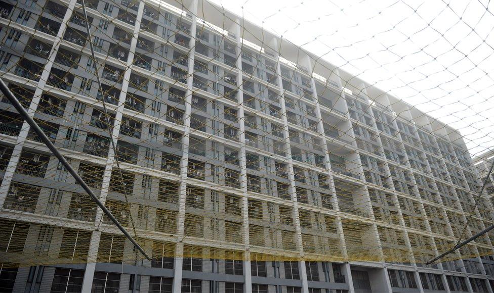 A protective net added to a Foxconn employee dormitory in Shenzhen, China