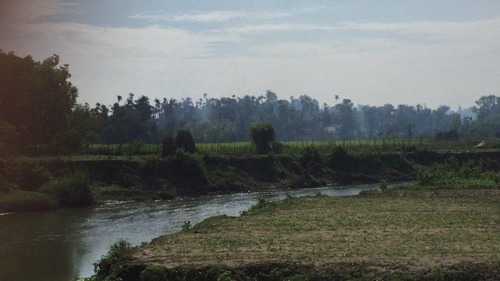 Smoke rises from Gawdu Zara village in Rakhine state, Myanmar, on 7 September 2017