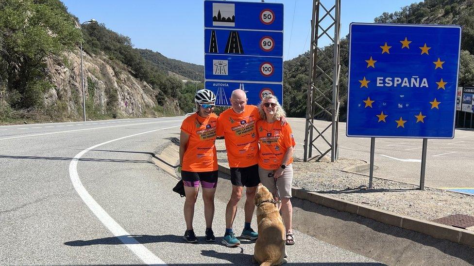 Neil Russell, his wife Nicky, cyclist Katie Miller and dog Oscar