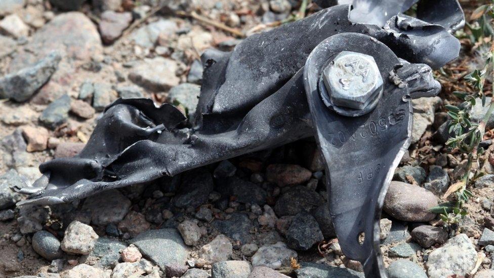 Bishkek embassy site, car vehicle shrapnel