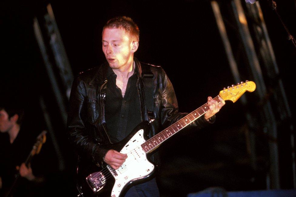 Thom Yorke from Radiohead plays guitar