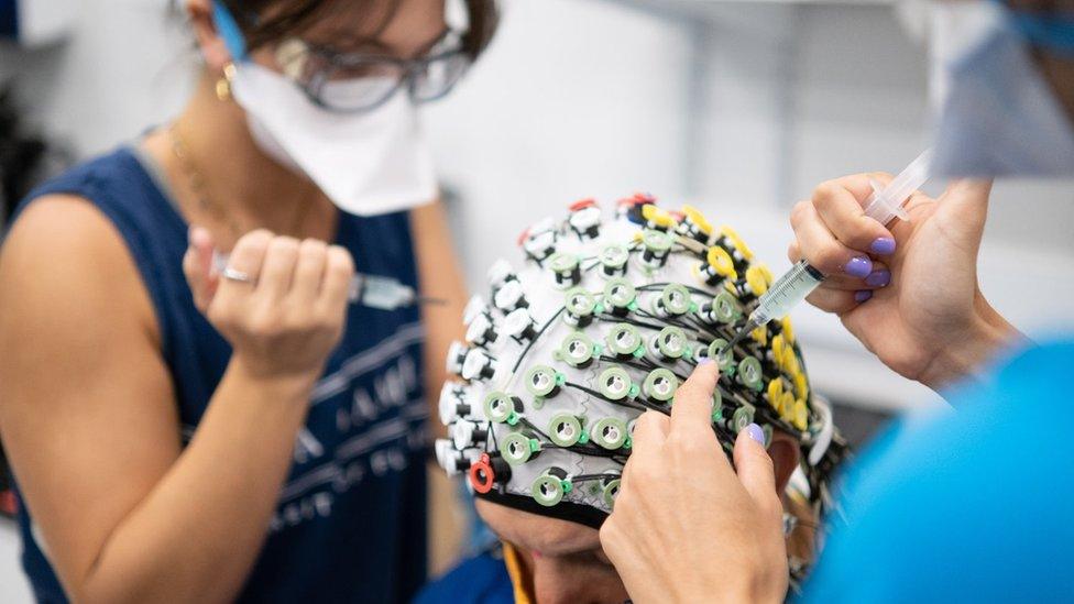 More than 100 electrodes capture fine detail of the brain activity of participants while they play a fast-paced game of table tennis.