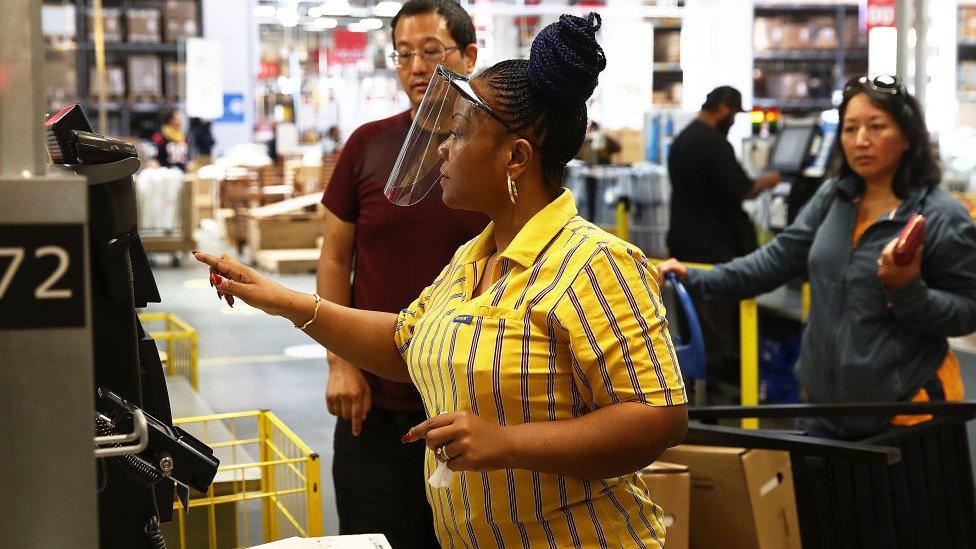 A cashier at Ikea